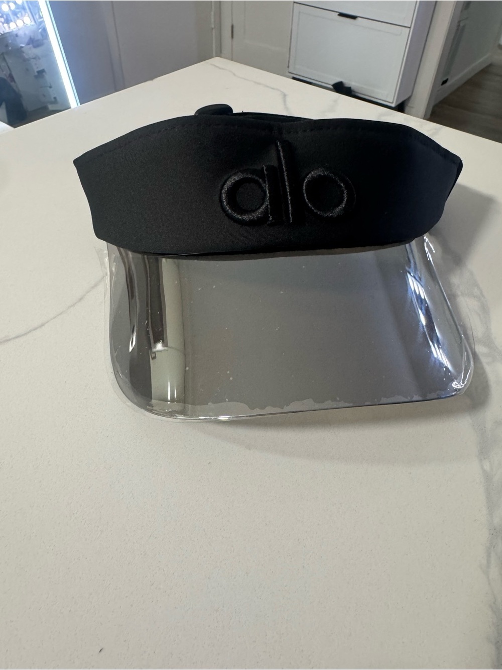 Black Visor with Clear Brim and Embroidered 'alo' Logo